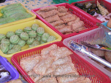 A variety of kueh sold at stalls.